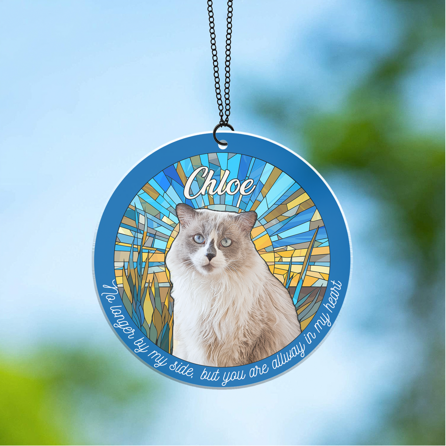 Stained glass memorial suncatcher with sunrise sunset design featuring cattails and water scene, creates rainbow light effects when hung in window