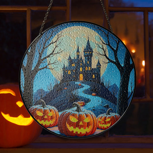 Round Halloween stained-glass style suncatcher with haunted castle and jack-o’-lantern pumpkins, hanging by a chain.
