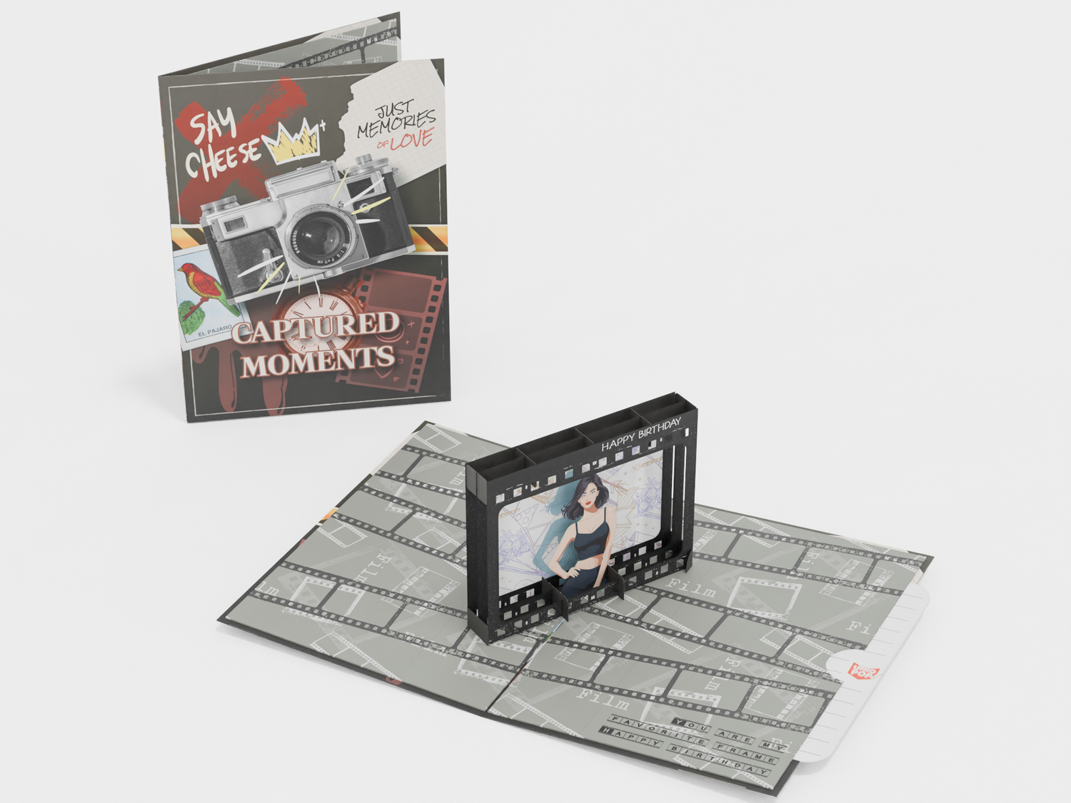 Pop-up greeting card with vintage camera design, photo frame element, and film-themed background titled “Captured Moments”